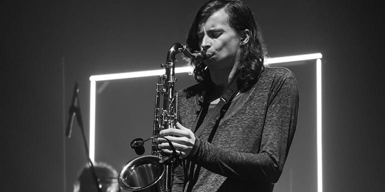 John Waugh playing saxophone