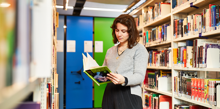 Library Female Student With Books